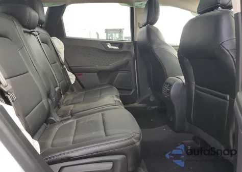 2020 Ford Escape Titanium z USA, uszkodzony, nr VIN 1FMCU9J95LUC33237